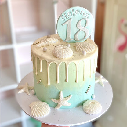 Shell beach cake with edible shell decoration